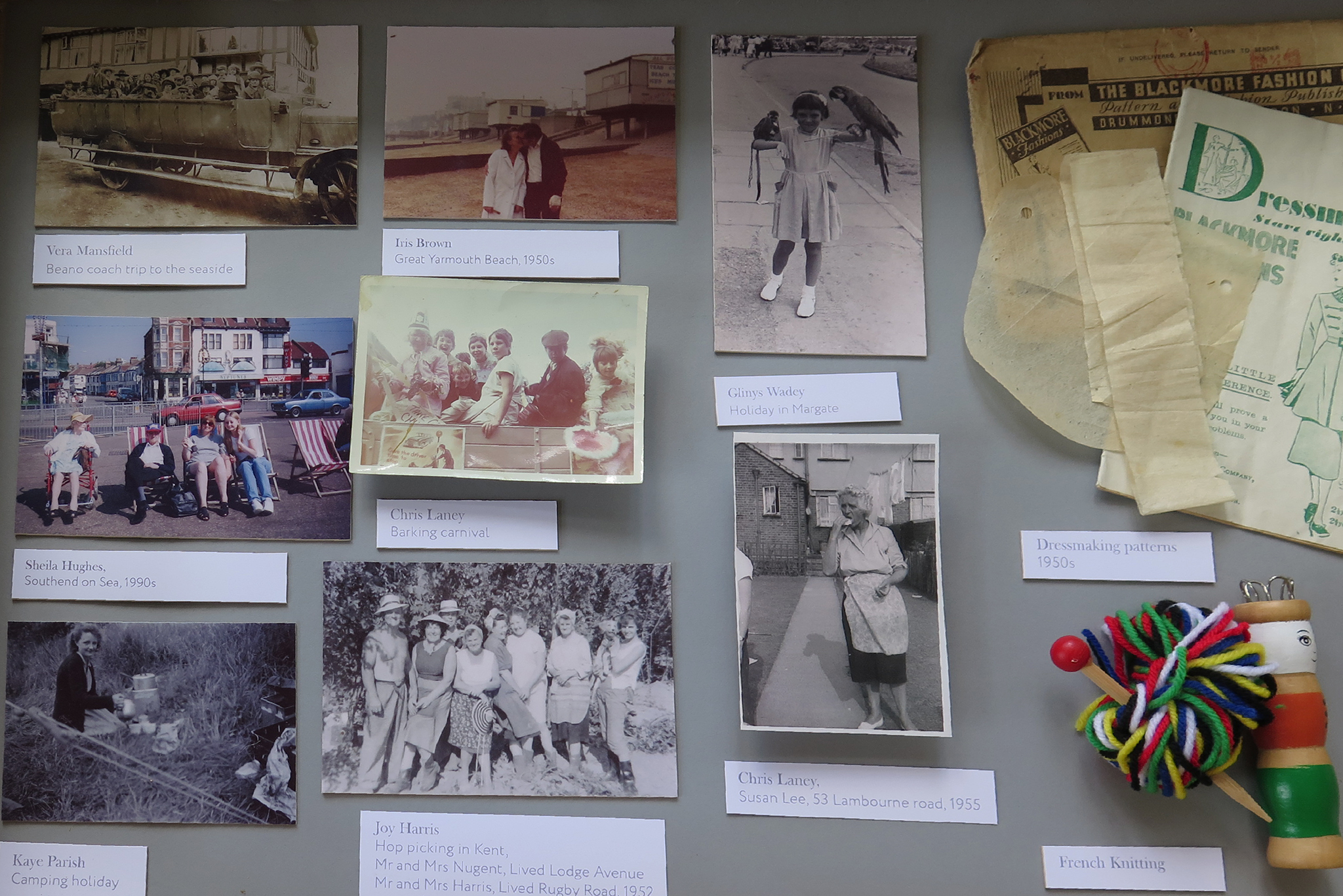 A display cabinet with photographs of Barking residents and their possessions